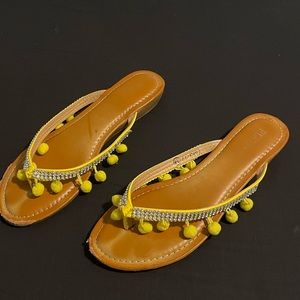 kid's yellow pompom sandals
